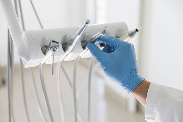 Professional Root Canal Treatment technician working in Palm Beach Shores, FL